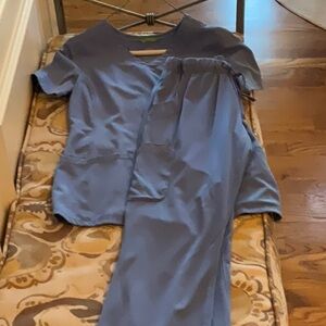 2 pair of healing hands scrubs 1 set blue and 1 set gray